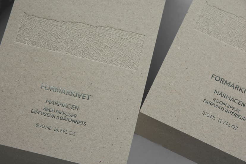 Exclusive rigid boxes for home scent products, with metallic foil and embossing.