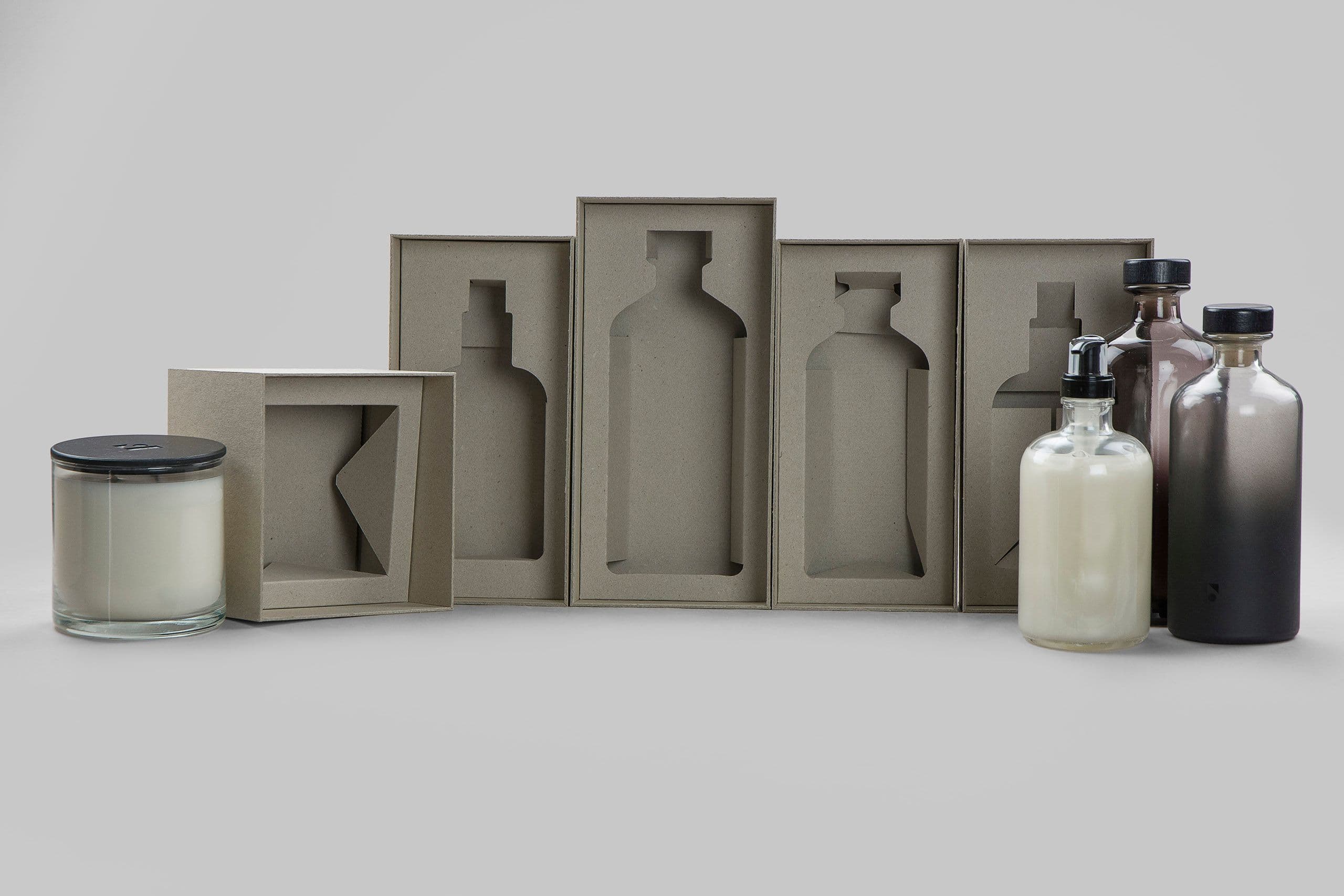 Exclusive rigid boxes for home scent products, with metallic foil and embossing.