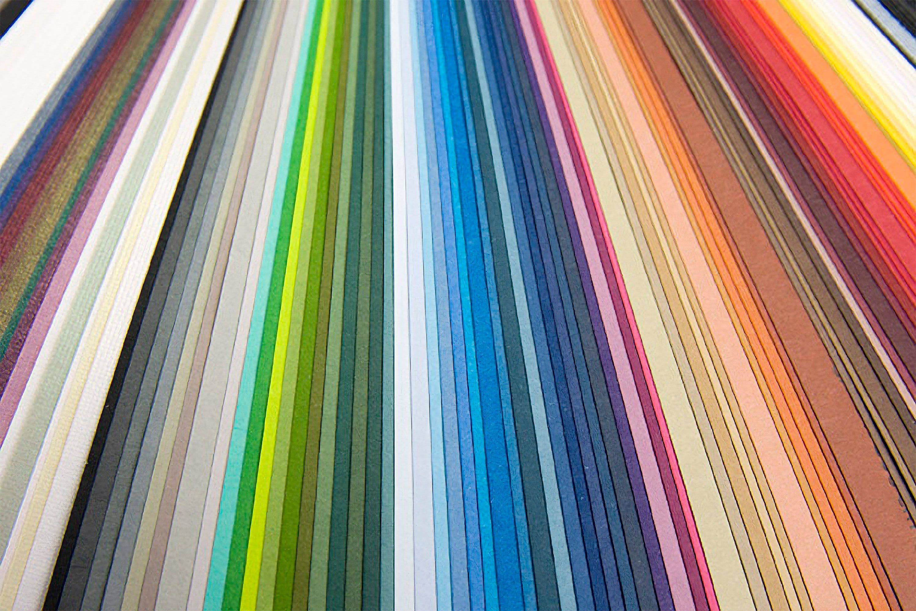 Coloured papers for packaging production