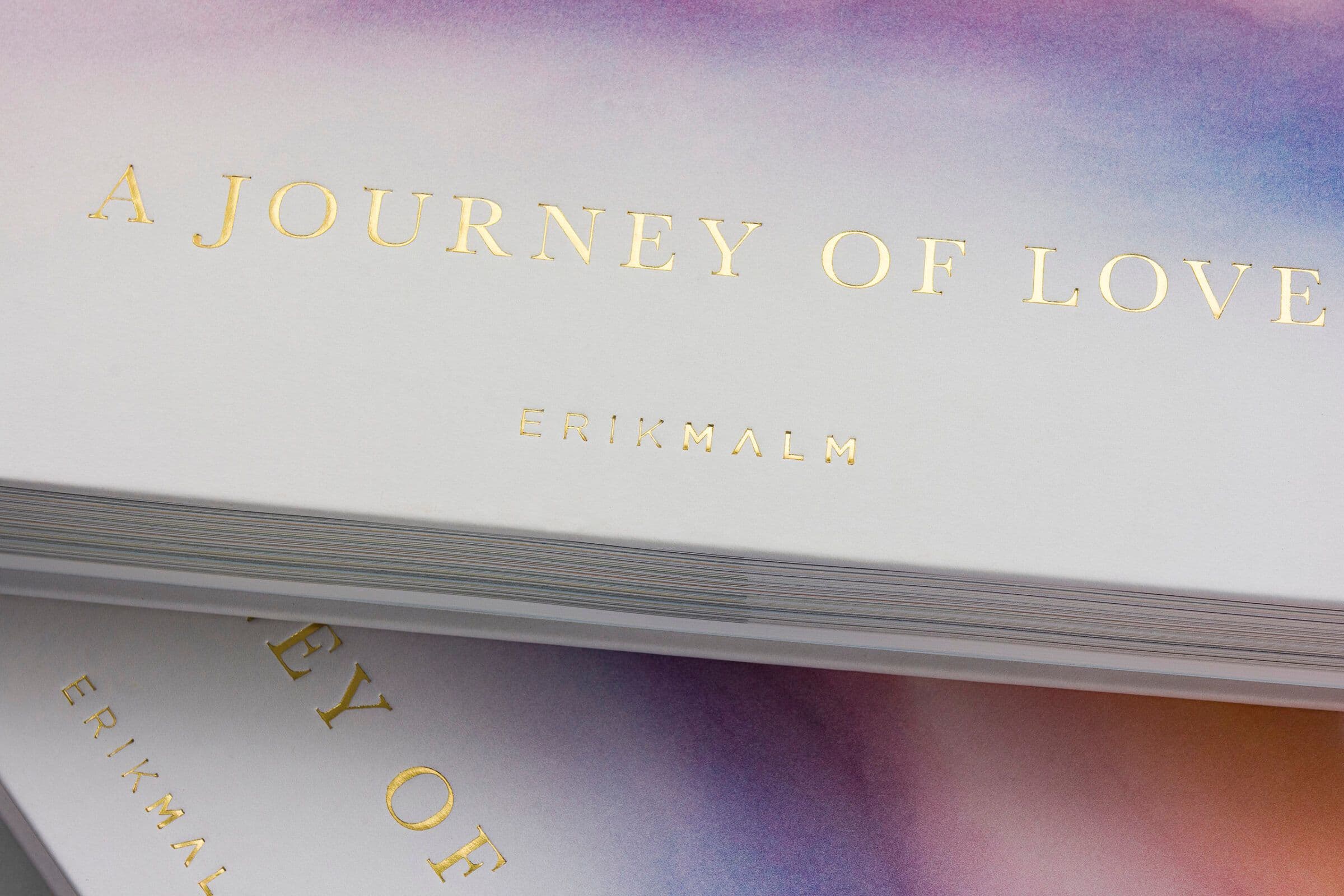 Hard cover book with printed cloth, foil stamping on front and spine